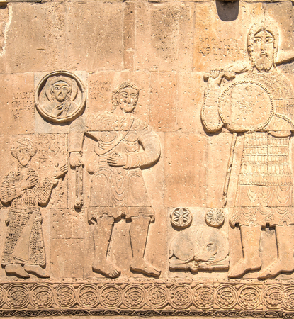 Van, Turkey - September 30, 2013:  David's fight with Goliath carving detail from Cathedral of the Holy Cross (Akdamar Kilisesi) on Akdamar (Aghtamar) Islandの写真素材
