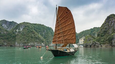 Ha Long Bay, Vietnam - December 02, 2015: Traditional boat at Halong Bay, Vietnam. Most popular place in Vietnamのeditorial素材