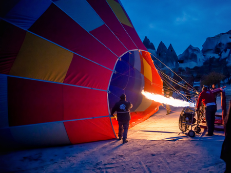 Cappadocia, Turkey - November 15, 2014:  Hot Air Balloon being hot air filled with flamesのeditorial素材
