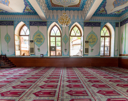 TBILISI, GEORGIA - August 06, 2015: The interior of Jumah (Friday) Mosque, decorated with arabic inscriptions from Quran and floral ornaments in blue gammaのeditorial素材