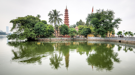 Hanoi, Vietnam - December 04, 2015: Tran Quoc pagoda in early morning in Hanoi, Vietnam. This pagoda is located on a small island near the southeastern shore of West Lake. This is the oldest Buddhist temple in Hanoi.のeditorial素材