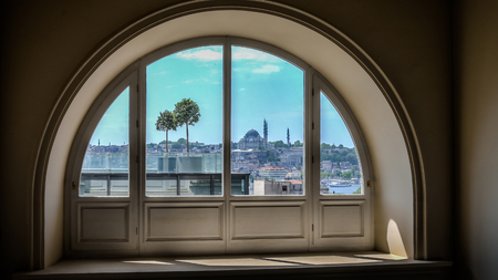 Istanbul, Turkey - March 13, 2013: Brief view of Eminonu and Golden Horn from a windowのeditorial素材