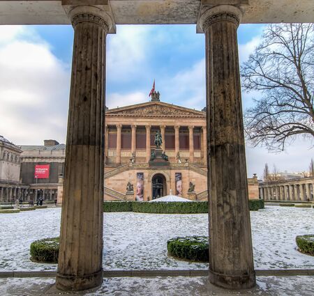Berlin, Germany - January 26, 2014: Exterior view of Alte Nationalgalerie (Old National Gallery) on the Museumsinsel in Berlin-Mitte. The Pergamon museum on the left in the background.のeditorial素材