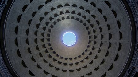 Rome, Italy - March 31 2017: Centered view of the ancient temple Pantheon dome hole oculusの写真素材