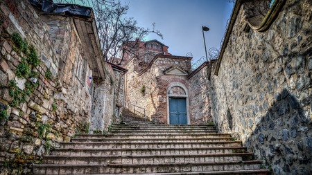 ISTANBUL, TURKEY - March 2, 2013:Vintage view of Traditional stone street and houses at Fener District at balat area.Street view in historical Balat district. Balat is popular attraction in Istanbul.のeditorial素材