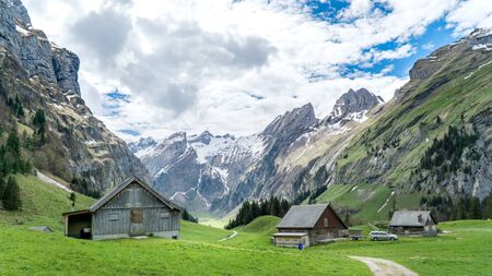 Seealpsee, Switzerland - May 2017: Seealpsee lake with the Swiss Alps in the background, Appenzeller Land, Switzerlandのeditorial素材