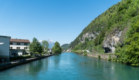 Interlaken, Switzerland - May 2017: Scenery of fishing village Iseltwiald on Brienz lake in Interlaken, Switzerland.のeditorial素材