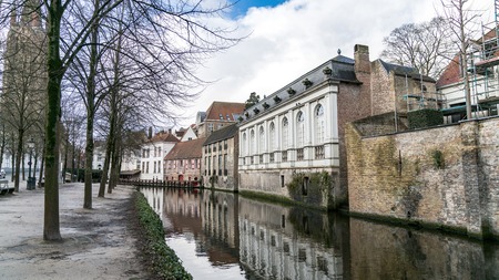 Bruges, Belgium - February 2018: Scenery of water canal in Bruges in winter, Venice of the North, cityscape of Flanders, Belgium.のeditorial素材