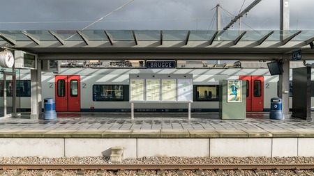 Bruges, Belgium, February 2018: - View of a sign saying Brugge at the Brugge Railway Station, a train station in the historic town of Bruges, a UNESCO World Heritage site in West Flanders, Belgium.のeditorial素材