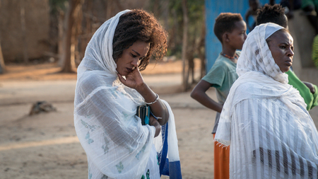 Turmi, Ethiopia - September 2017: Portrait of an unidentified Ethiopian woman celebrating the Meskel festival in Ethiopia. Meskel commemorates the finding of the True Crossのeditorial素材