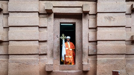 Lalibela, Ethiopia - September 2017: Unidentified priest at one of the old rock churches from...