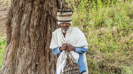 Lalibela, Ethiopia - September 2017: Pilgrim at one of the old rock churches from Lalibelaのeditorial素材