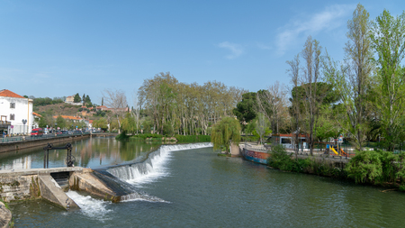 Tomar, Portugal, April 2018: Tomar city center with Nabao river, Santarem District in Portugalのeditorial素材