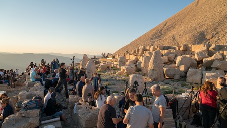 Adiyaman, Turkey - July 2018: A group of photographers at the top of Nemrut Mountain near Commagene statue ruins waiting for sunset in Adiyaman, Turkeyのeditorial素材