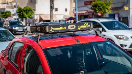 Casablanca, Morocco - May 2018: Taxi sign on the roof of a car at nightのeditorial素材