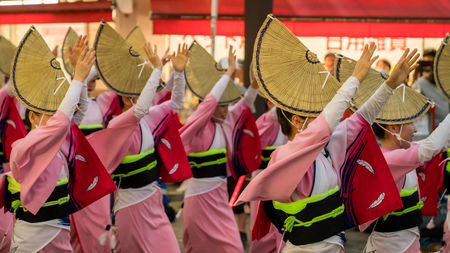 Tokyo, Japan - August 2018: Japanese performers dancing traditional Awaodori dance in the famous Koenji Awa Odori festival.のeditorial素材