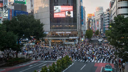 Tokyo, Japan - August 2018: Blurred unidentified pedestrians walking at Shibuya Crossing in Tokyo, Japanのeditorial素材