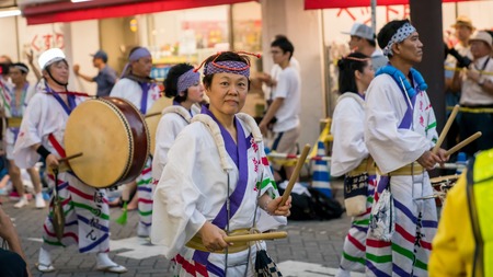 Tokyo, Japan - August 2018: Japanese performers dancing traditional Awaodori dance in the famous...