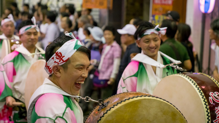 Tokyo, Japan - August 2018: Japanese performers dancing traditional Awaodori dance in the famous Koenji Awa Odori festival.のeditorial素材