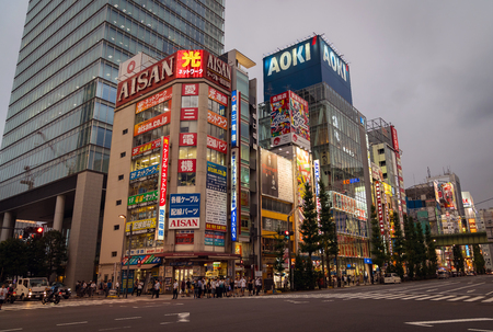 Tokyo, Japan - August 2018: Akihabara Crosswalk Junction in the evening with colorful lights. Japanese Cross The Road On Akihabara Street, Japan.のeditorial素材