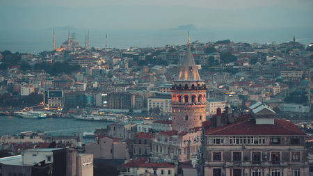 istanbul, Turkey - September 2018: Istanbul cityscape with Galata Tower and mass housing in Golden...