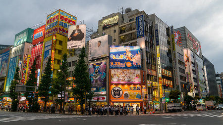Tokyo, Japan - August 2018: Akihabara Crosswalk Junction in the evening with colorful lights. Japanese Cross The Road On Akihabara Street, Japan.のeditorial素材