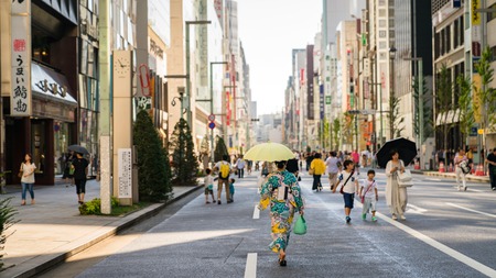 Tokyo, Japan - August 2018: Shopping district Ginza with famous Chuo Dori street that closes to cars on Sundays and becomes a pedestrian streetのeditorial素材