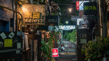Tokyo, Japan - August 2018: Traditional street bars in Shinjuku Golden Gai district at night. Golden gai district has around 200 tiny barsのeditorial素材