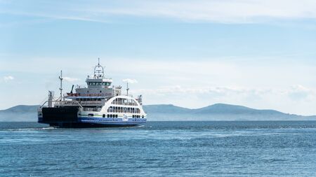 Marmara island, Balikesir - August 2019: Car and passenger ferry from Gestas company approaching Marmara island harbour, Marmara seaのeditorial素材