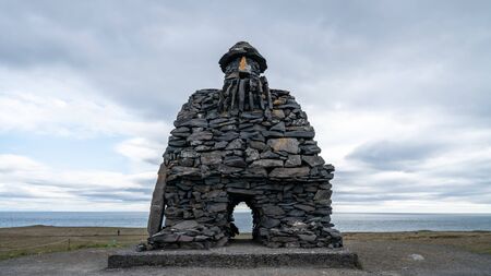 Arnarstapi, Iceland - August 2019: Stone monument to mythological hero Bardur Snaefellsasのeditorial素材