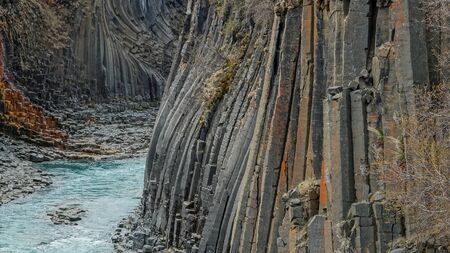 Studlagil basalt canyon, with rare volcanic basalt column formations, Iceland