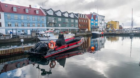 Torshavn, Faroe Islands - August 2019: Fishing boats in Torshavn harbour on Faroe islands.のeditorial素材