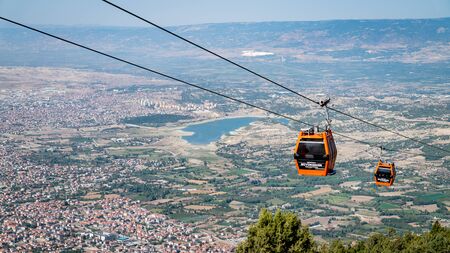 Denizli, Turkey - October 2019: Cable car riding down to Bagbasi plateau from Denizli city center
