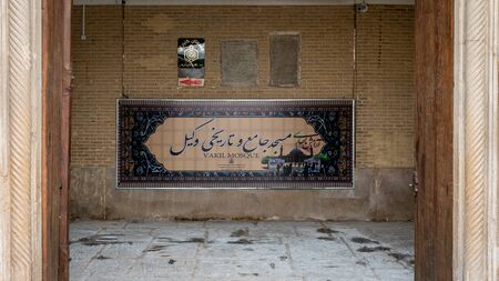 Shiraz, Iran - May 2019: Entrance signage of Vakil Mosque, Shabestan. Vakil means regent, title of Karim Khan, founder of Zand Dynasty.のeditorial素材