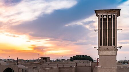 Yazd, Iran - May 2019: Yazd cityscape with a badgir, wind catching tower during sunsetのeditorial素材