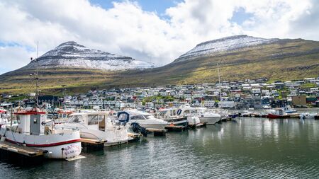 Klaksvik, Faroe Islands - June 2019: Boats in a Port in Klaksvik, the second largest town of the Faroe Islands, autonomous region of the Kingdom of Denmarkのeditorial素材