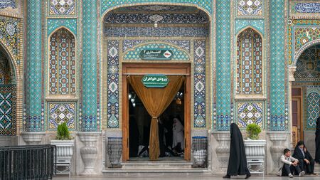 Shrine of Fatima Masumeh, Qom, Iran - May 2019: Iranian women walking inside Shrine of Fatima Masumeh in Qom, which is considered by Shia Muslims to be the second most sacred city in Iran.のeditorial素材
