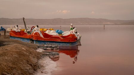 Mahorloo, Shiraz, Iran - May 2019: Abandoned pedal boats by the Maharloo pink lakeのeditorial素材