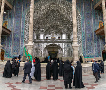 Shrine of Fatima Masumeh, Qom, Iran - May 2019: Visitors and worshippers inside of Shrine of Fatima Masumeh in Qom, which is considered by Shia Muslims to be the second most sacred city in Iran.のeditorial素材