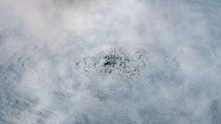 Hverir Myvatn geothermal area with natural steam vents and mud pools all around Lake Myvatn, the Hverir geothermal fields, Icelandの写真素材