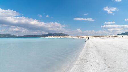 Tourists walking in the beach of Salda Lake. Salda Lake became famous as Maldives of Turkey
