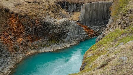 Studlagil basalt canyon, Iceland. This is a rare volcanic basalt column formationの写真素材