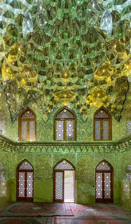 Shiraz, Iran - May 2019: Interior design of Shah e Cheragh Shrine and mausoleum, the mirror mosque