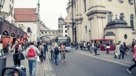 Munich, Germany - April 2014: People walking on the streets of Munich city center, Munchen city...