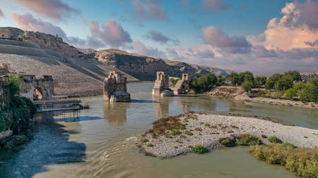 Hasankeyf, Turkey - Remains of the town of Hasankeyf on the River Tigris, famous with stone caves after it is evacuated. The town will be sunk under water of ilisu damの写真素材