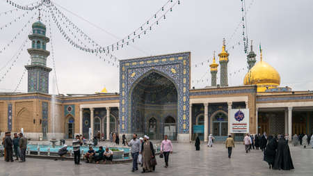 Shrine of Fatima Masumeh, Qom, Iran - May 2019: Visitors and worshippers inside of Shrine of Fatima Masumeh in Qom, which is considered by Shia Muslims to be the second most sacred city in Iran.のeditorial素材