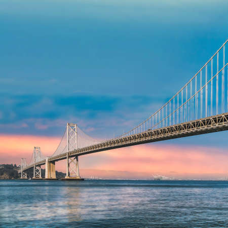 San Francisco, CA, USA - August 2019: Panoramic view of San Francisco Bay bridge. Also known as the San Francisco - Oakland Bay Bridge, is a complex of bridges spanning San Francisco Bayのeditorial素材