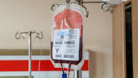 Ankara, Turkey - March 2021: Blood transfusion serum in hospital room with blood drip