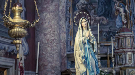 Vienna, Austria - May 2014: Virgin Mary sculpture, the mother of Jesus in the Christian religion. This statue is a symbol of devotion and faith.のeditorial素材