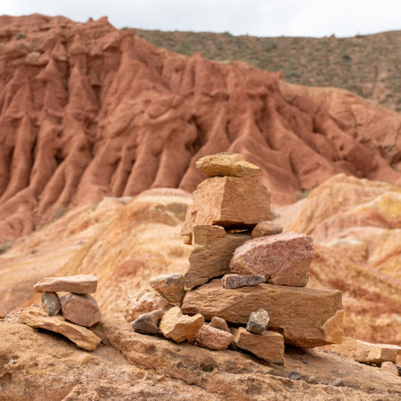 Scenery from Fairytale Canyon, unique rock formation located in Kyrgyzstan. Canyon is known for its unusual and colorful rock formations, which have been shaped over time by wind and water erosion.の写真素材